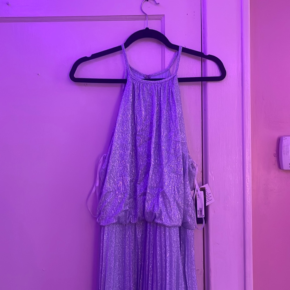 I don’t like never worn, little wrinkled because of the storage good as new!